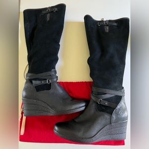 UGG boots. Tall. Leather/suede material. Great condition!! Size 7. WATERPROOF!!